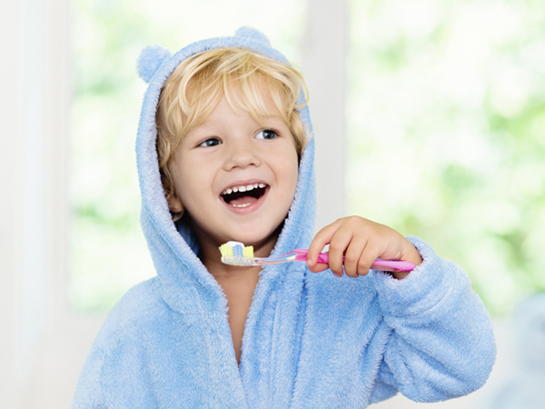 little boy brushing