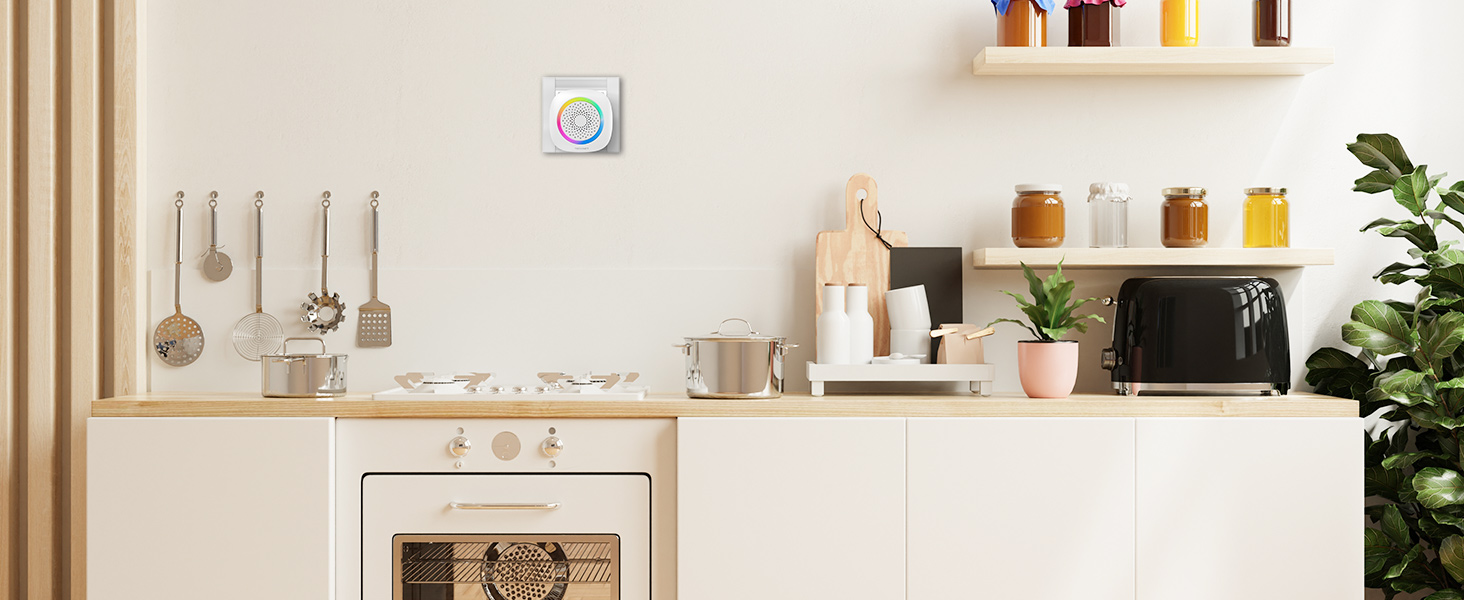 Modern minimalist kitchen with white cabinets, hanging utensils, floating shelves displaying jars, and appliances including microwave and oven.