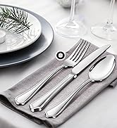 silverware set with serving utensils and steak knives