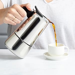 stainless steel espresso maker pouring