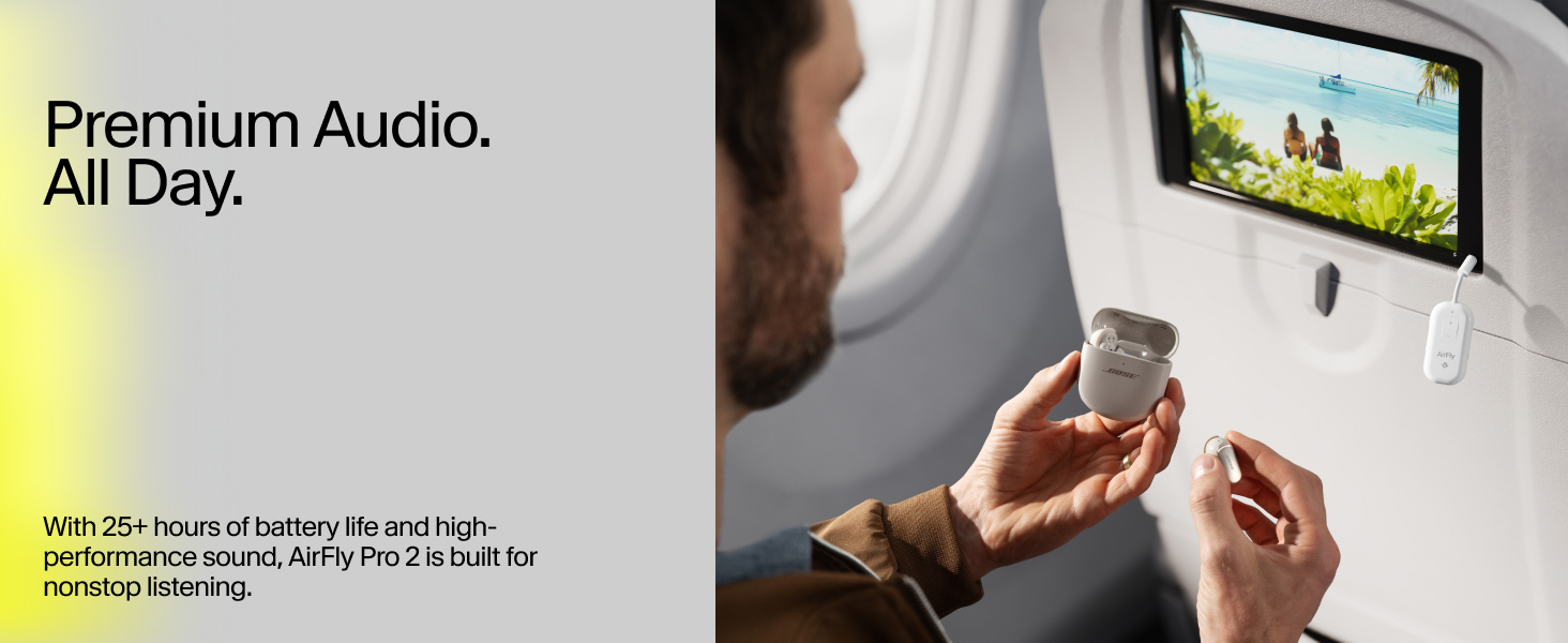 Man pairs Bose earbuds with AirFly Pro 2 on airplane to watch in-flight screen wirelessly.