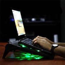 hands typing on laptop