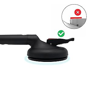 Black car phone mount with suction cup base, featuring a quick-release mechanism and correct mounting position indicator shown with green checkmark.