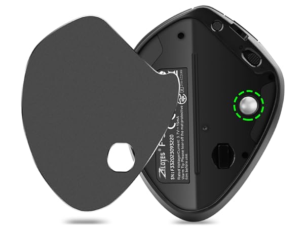 Step 1 Push the trackball out of its groove through the dedicated hole on the bottom of the mouse.