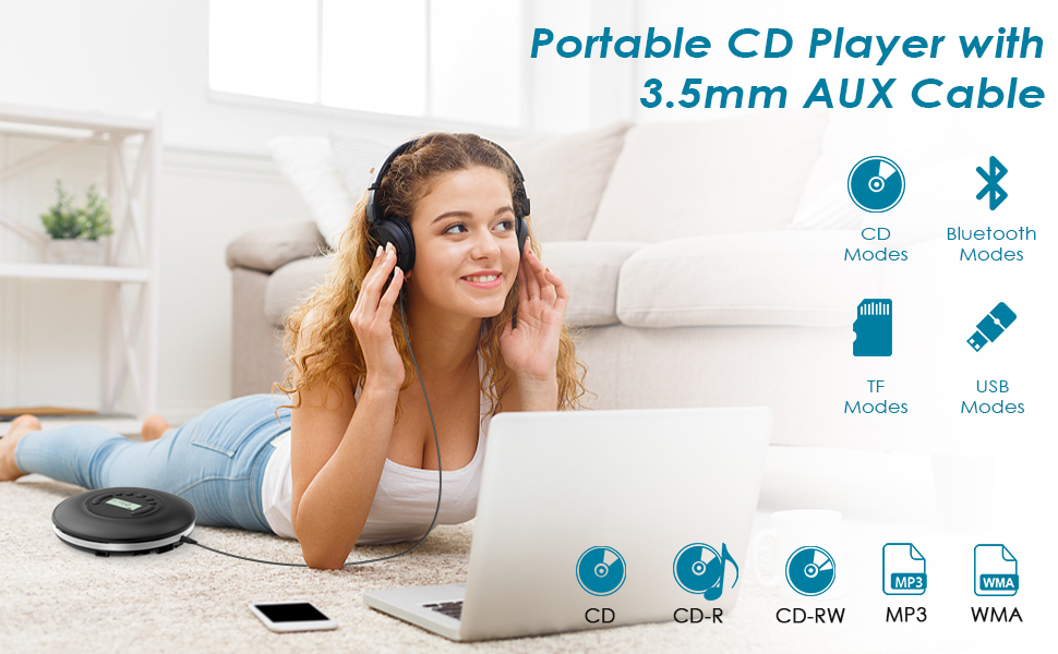 a woman lying on the floor with headphones on her head