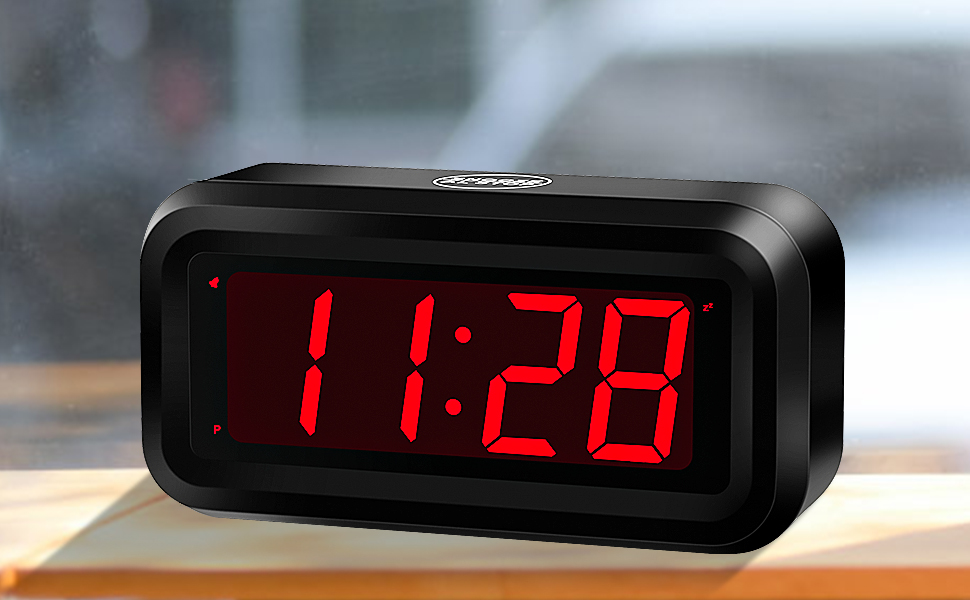 led digital clock beside clock for bedroom