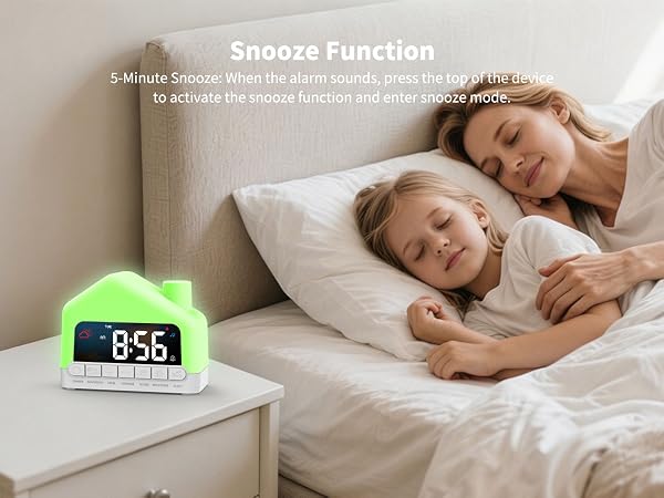 Text reads 'Snooze Function' describing capability of adjusting alarm before ringing. Two adults sleeping peacefully on white pillows with digital green alarm clock displaying 8:56 on white nightstand.