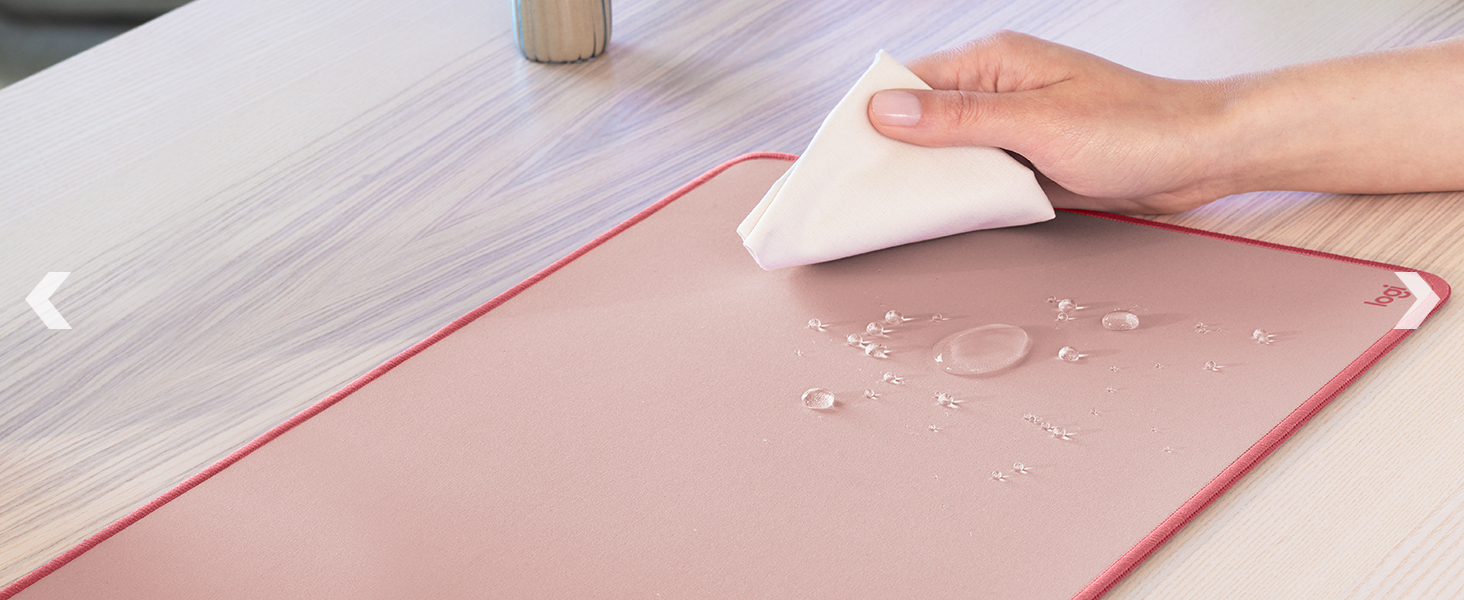 zoom of a woman cleaning studio series desk mat large dark rose mouse pad