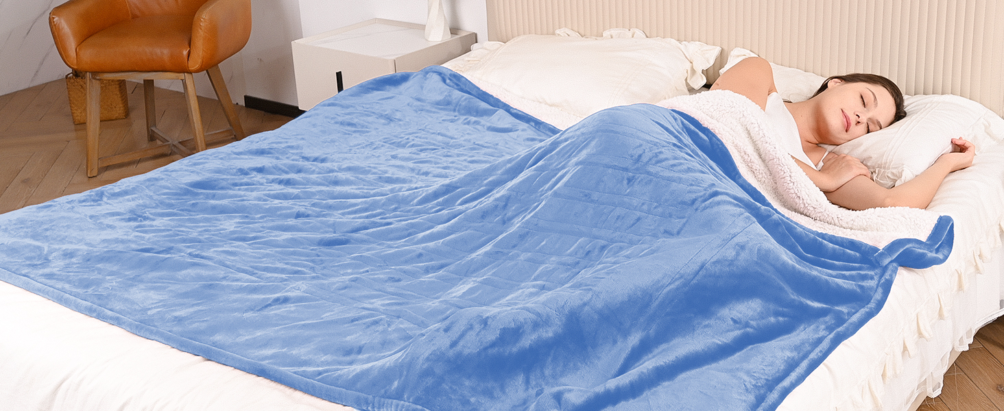 Sleeping on a bed with heated blanket.