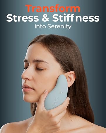 person using the muscle massager on their jaw