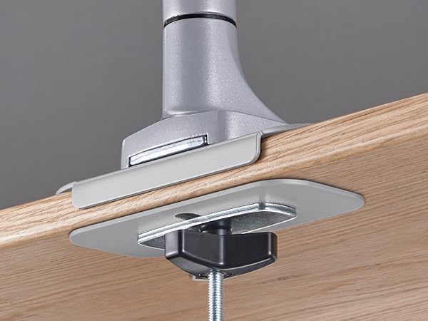 A flush grommet installation allows the desk to sit against the wall