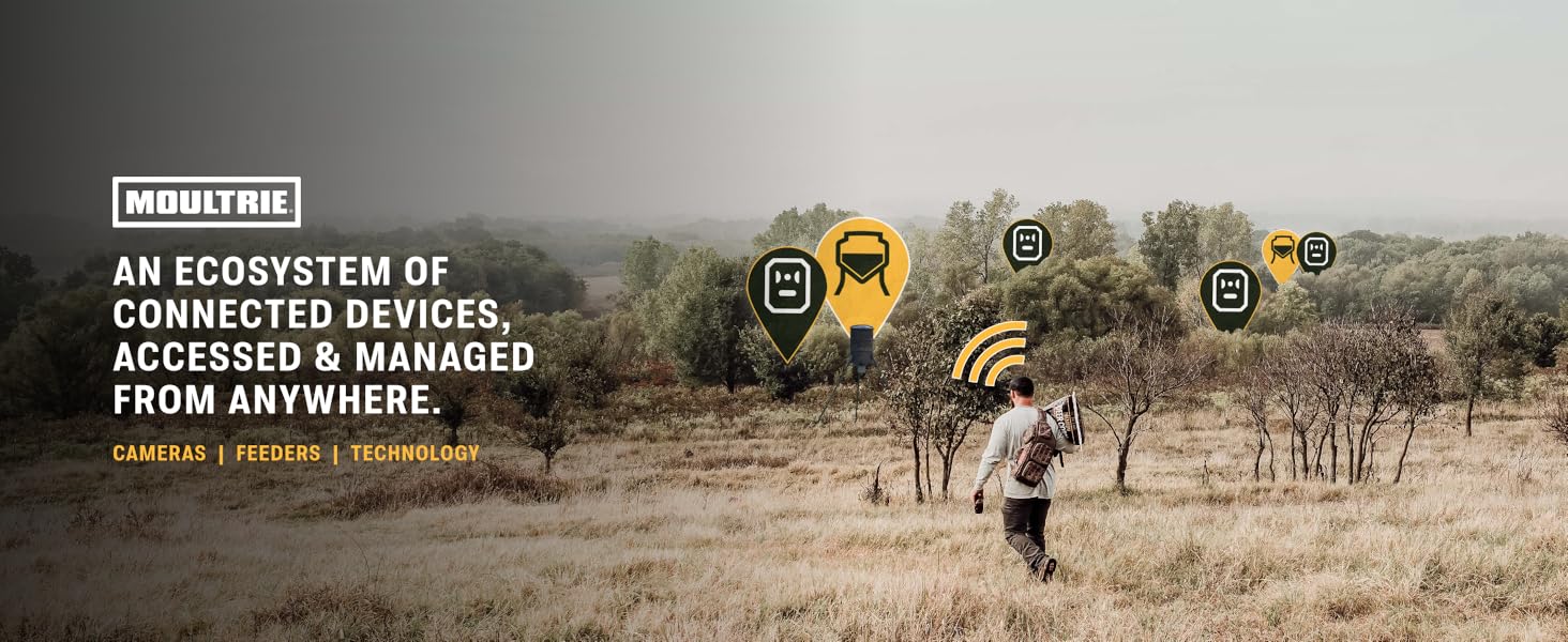 Hunter in field with connected Moultrie devices managed remotely.