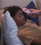 Microlife non-contact forehead thermometer taking a child's temperature, they have a fever