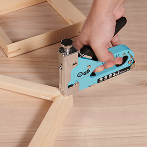 drive staples to fasten photo frame