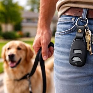 Garage remote attached to belt loop while walking dog outdoors