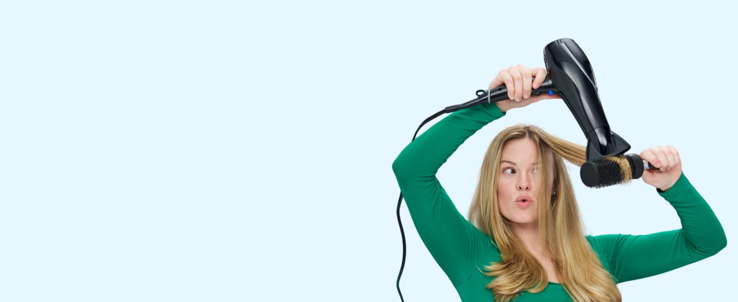 Woman drying hair
