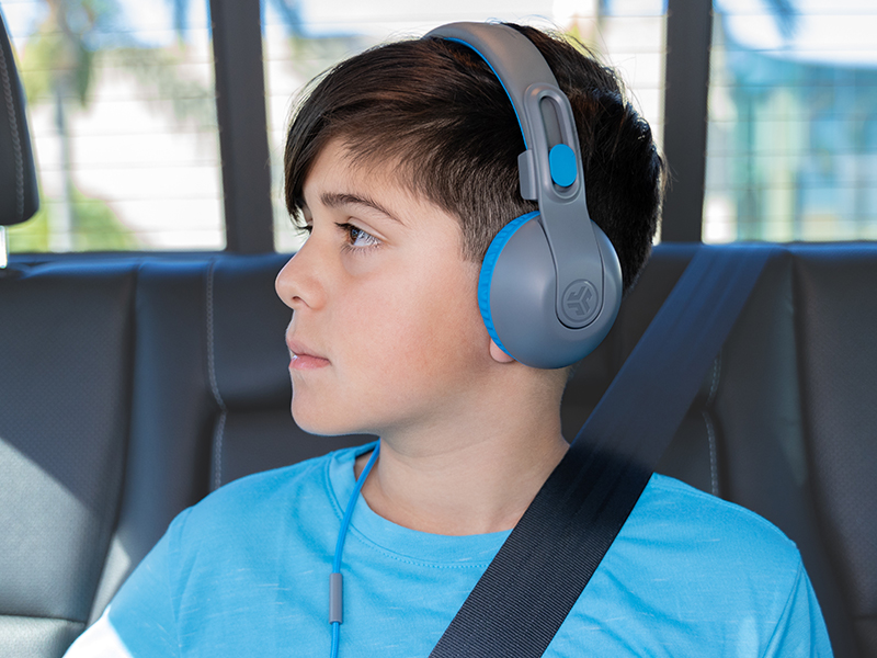 Blue JBuddies Studio 2 Wired Headphones on a young boy