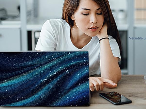 Text reads: 'Laptop Skin'. Woman working at desk with blue laptop, coffee cup and snacks. Shows laptop with decorative skin covering.