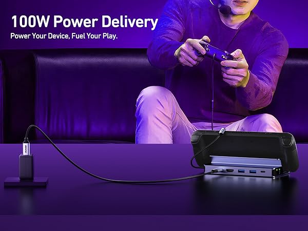 Text reads '100W Power Delivery'. Purple-tinted product demonstration images showing electronic charging or power delivery system.