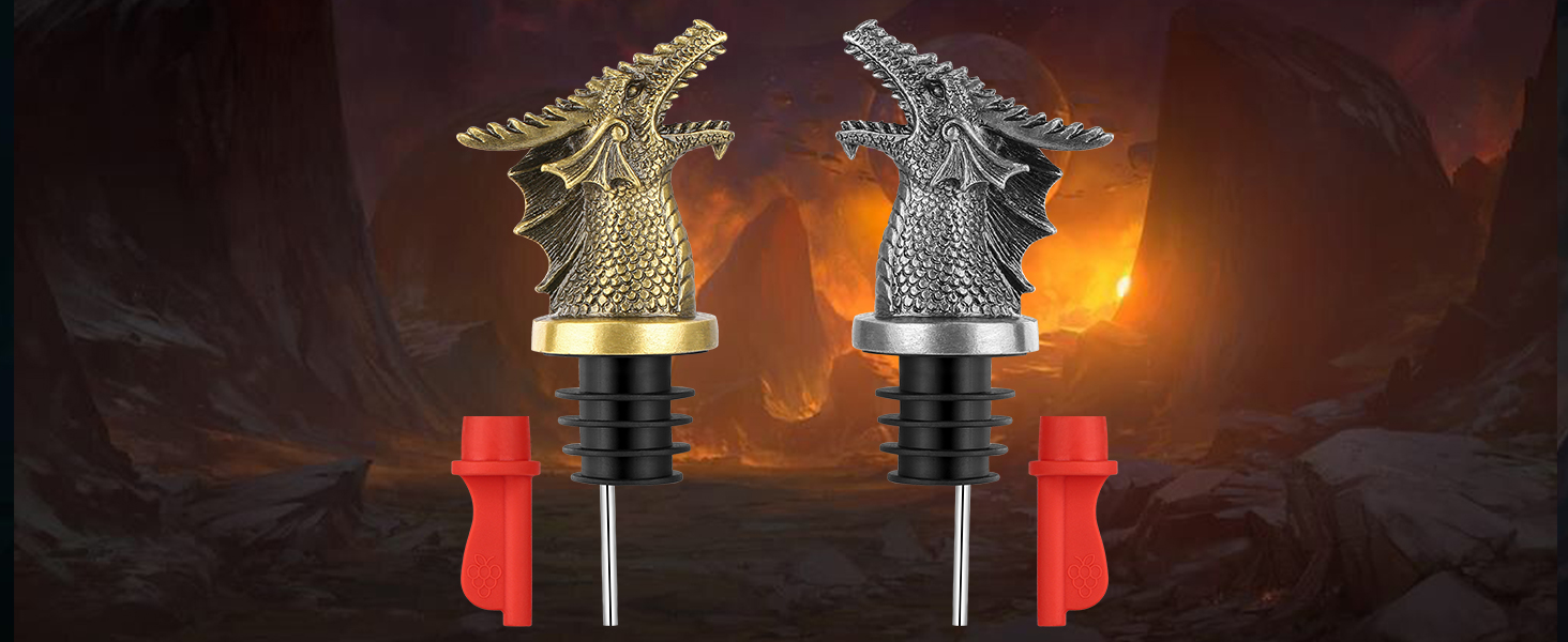 Two decorative dragon-shaped figures in gold and silver finishes, mounted on red bases with black stems against a fiery background.