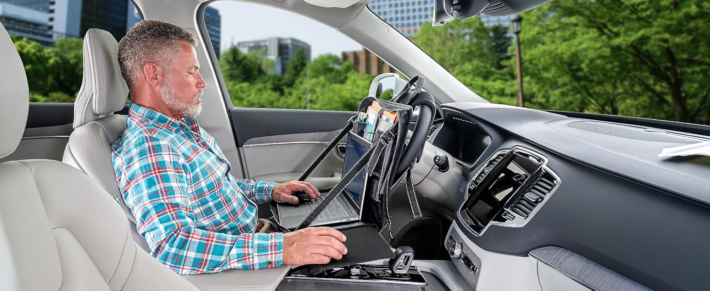 High Road Car Steering Wheel Desk in vehicle with man working in car office