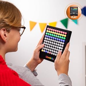 lifestyle kid playing with lite brite touch