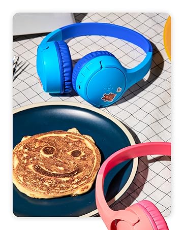 Image of belkin kids headphones next to a plate of pancakes.