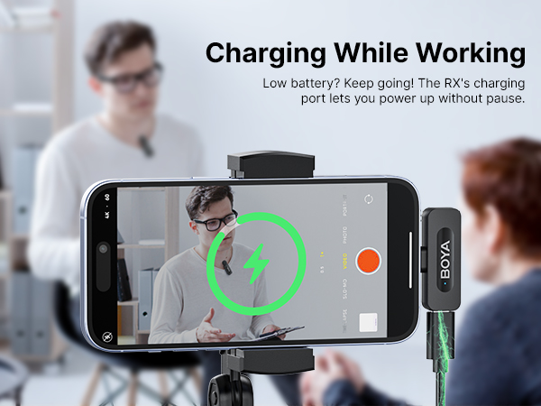 Smartphone charging mount demonstration showing device with circular charging indicator and text overlay about continuous power while recording.