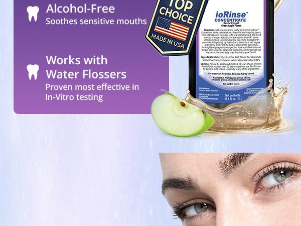 Alcohol-free oral irrigant concentrate compatible with water flossing systems