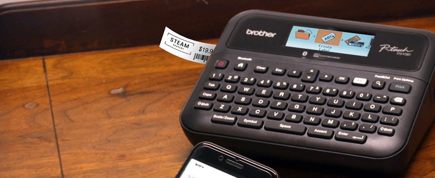 Label maker on desk, printing retail shelf label with brand logo, MSRP, and barcode