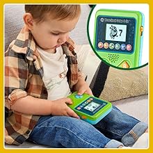 Kid guides his character on screen to eat up their snacks! Counting snacks eaten along the way. 