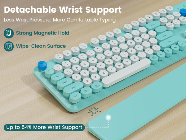 Keyboard on desk with detachable magnetic wrist rest, showing strong hold and wipe-clean surface.