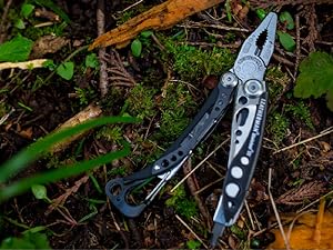 Photo shows Skeletool CX on a forest floor