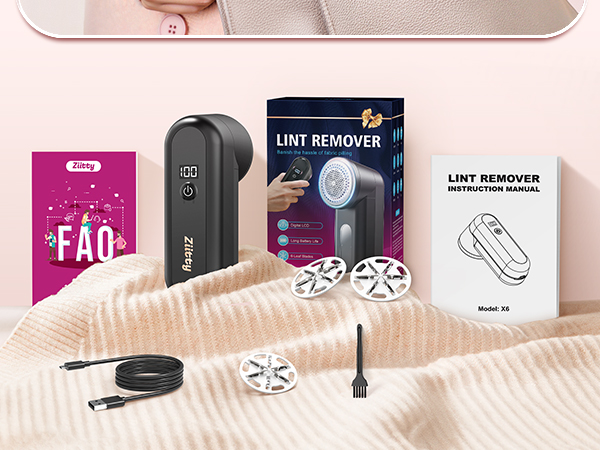 Collection of lint removal products including electric lint remover, cleaning brushes, and product packaging displayed on beige fabric.