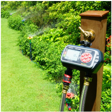 2-Zone Digital Water Timer hooked up to hose bib faucet