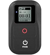 Black camera remote control with LCD screen displaying 4K-30 recording mode, 00:01 timer, and 1H:04 battery life. Features red circular button and mode button below.