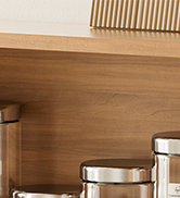 Glass container with airtight bamboo lid, suitable for kitchen storage, shown with wooden background and minimalist design.