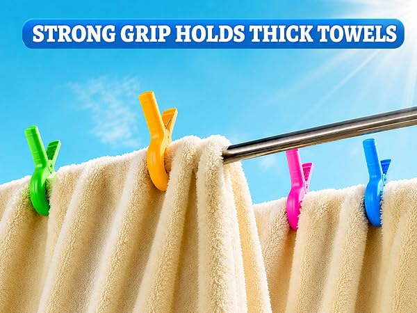 Strong grip beach towel clips hold thick towels on beach and pool chairs