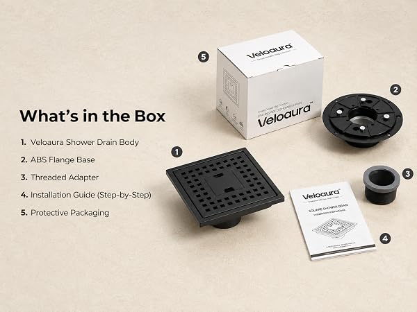 Veloaura matte black square shower drain kit with flange base adapter guide and box