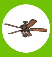 Aged walnut Brentford 52-in. outdoor ceiling fan, dark wood finish blades, lantern-style LED light.
