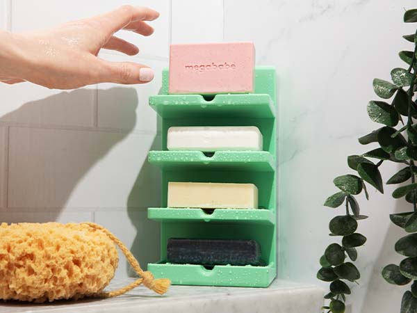 Bar soap tower next to sponge.