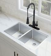 Double basin stainless steal kitchen sink, with a matte black chef faucet.