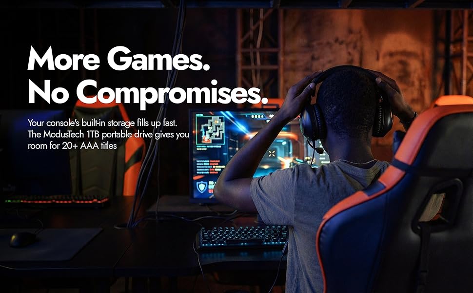 Gamer at PC desktop setup with headset and gaming chair