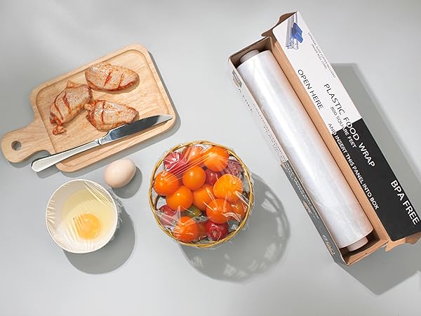 Plastic wrap on display with bowl of vegetables covered in wrap