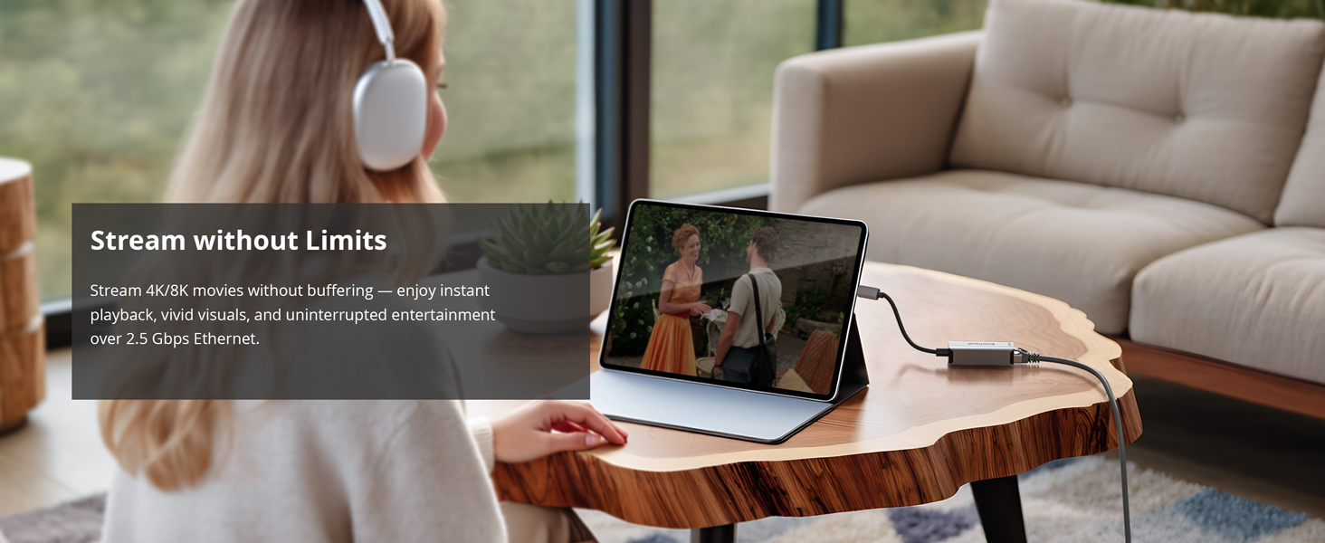 A Woman Is Streaming 4K 8K Video on iPad using the USB-C to Ethernet Adapter