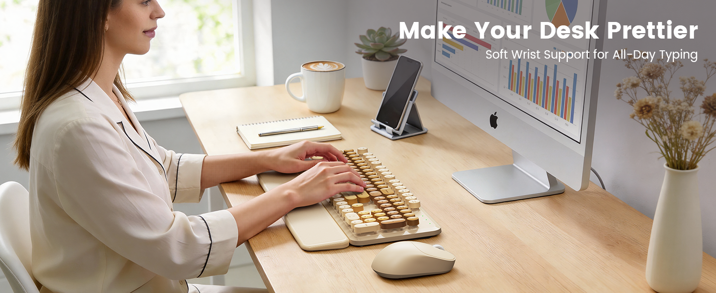Woman typing on beige wireless keyboard mouse combo with wrist rest on tidy desk