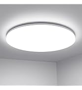 Circular LED ceiling light fixture with a slim white frame, mounted flush against a white ceiling. The light emits a bright, even glow across its entire surface.
