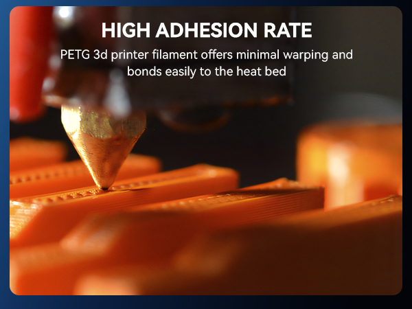 Close-up of 3D printer nozzle extruding orange filament onto a heated print bed, demonstrating high adhesion rate of PETG material.
