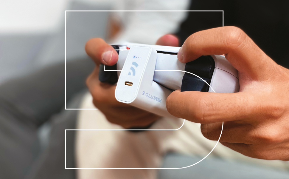 White electronic device being held in hands, showing close-up of connection or charging port with highlighted interface area.