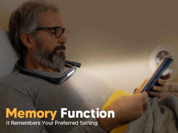 A old men is reading in bed with EastPin LED neck light which has memory function